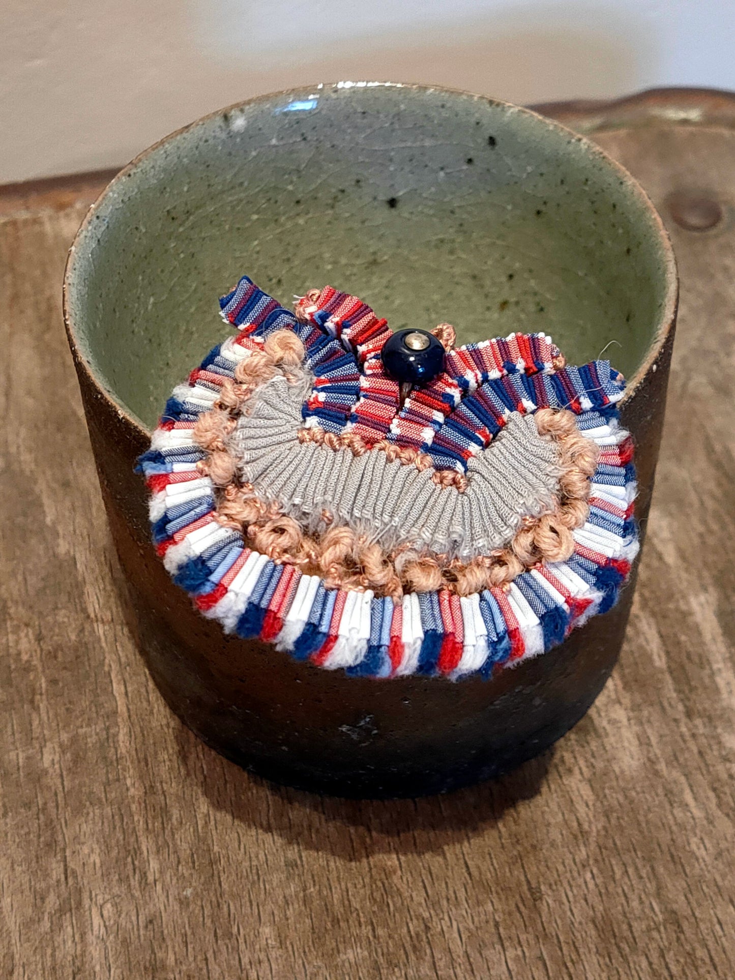 Broche en tissu plif tripot