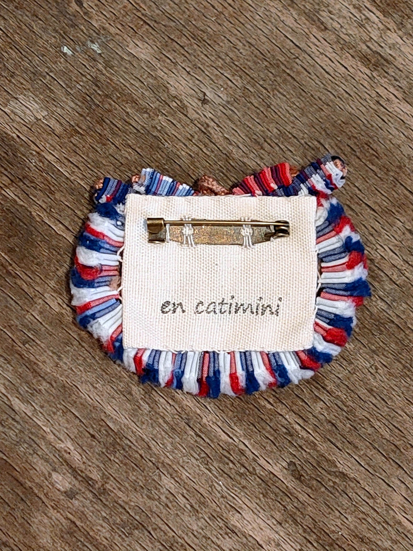 Broche en tissu plif tripot