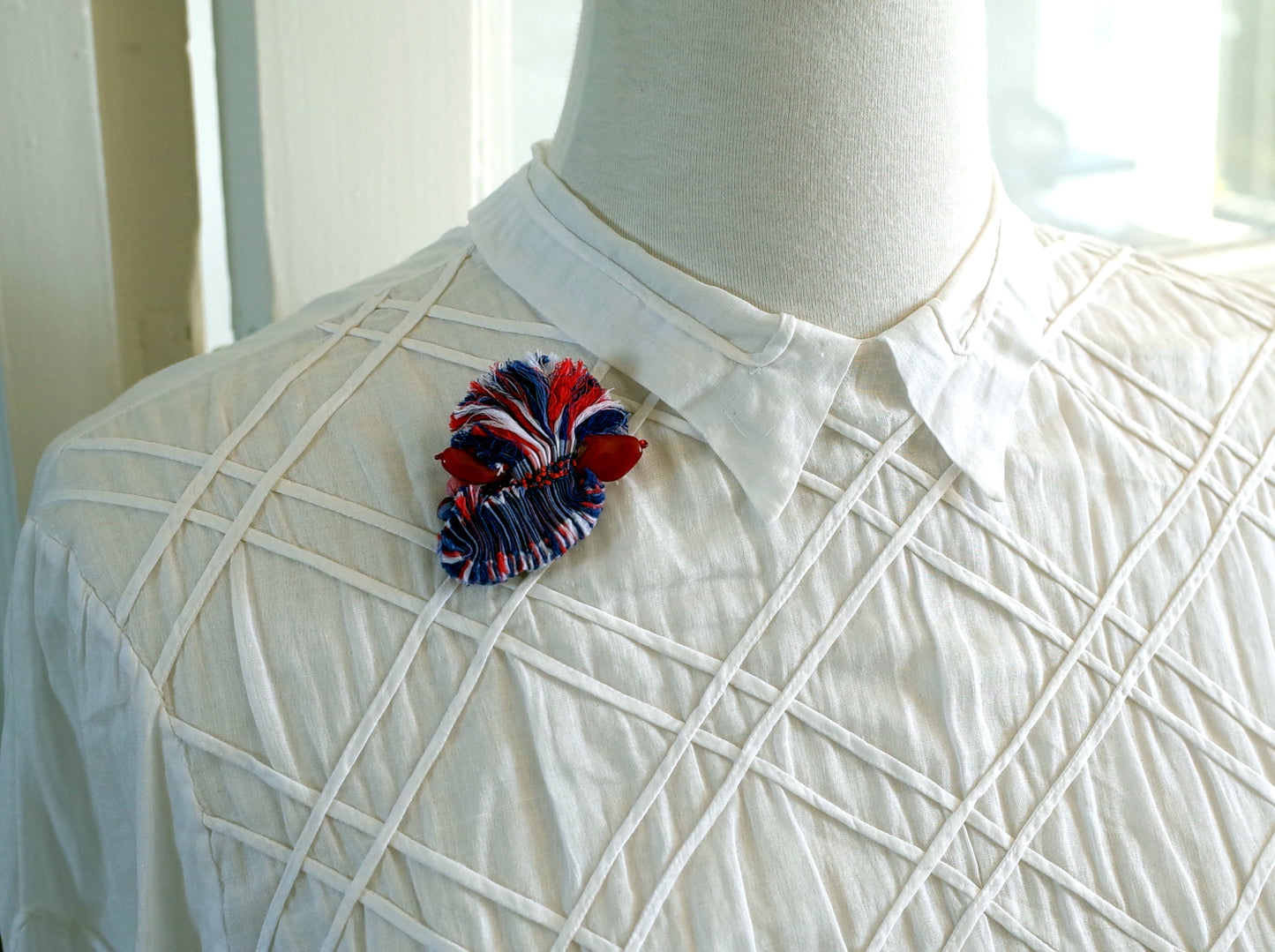 Broche en tissu plif rbbtri