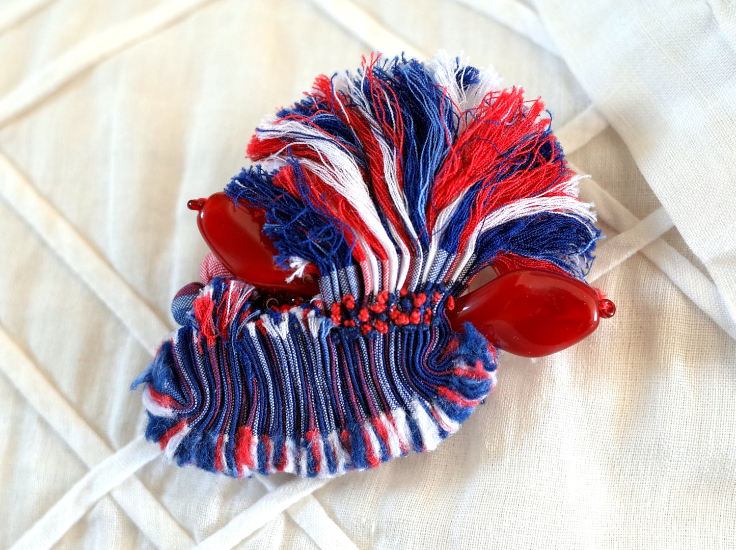 Broche en tissu plif rbbtri