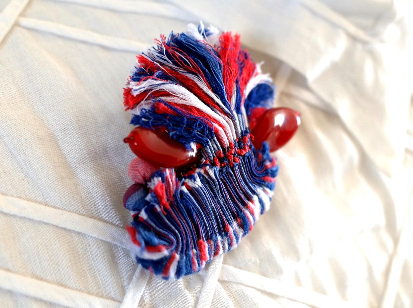 Broche en tissu plif rbbtri